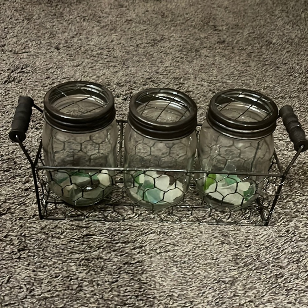 Antique wire jar holder, wood handles with 3 jars with lids with wire lids.
